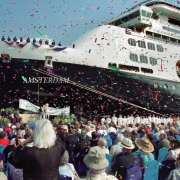 FORT LAUDERDALE Ñ Confetti flies as Holland America LineÕs newest ship, the $300 million ms Amsterdam, is dedicated at Port Everglades Monday, Oct. 30. Janet Lanterman, wife of Holland America Chairman and CEO Kirk Lanterman, served as the AmsterdamÕs godmother. The 1,380-passenger, 61,000-ton vessel is the 10th ship in Holland AmericaÕs fleet. On-board amenities include an all-suite deck with concierge services, the Web Site Internet caf, the Odyssey gourmet Italian alternative restaurant, seven bars and lounges, a full casino and spa facilities. Following the ceremony Amsterdam set sail on a series of 10-day Panama Canal cruises from Fort Lauderdale. In April the ship is to reposition to Europe, and in January 2002 is slated to sail on a 100-day Grand World Voyage. Photo by Andy Newman/HAL